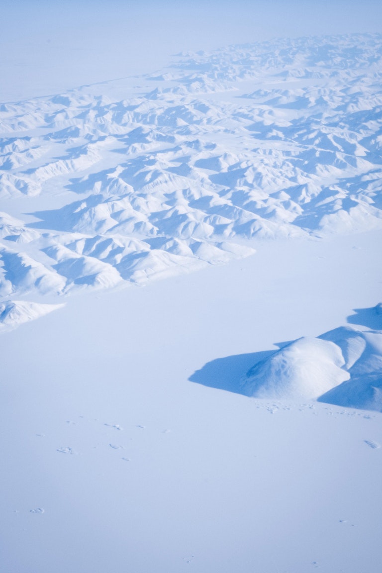 Areal photo of ice mountains on the arctic