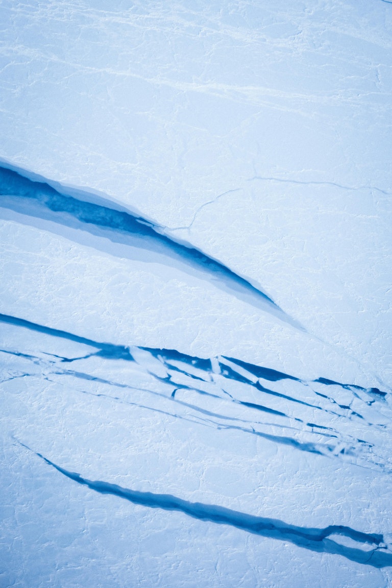 Areal photo of cracked ice on the arctic